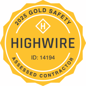 Highwire 2025 Gold Safety Award Gold circular badge featuring bold black text that reads "2025 Gold Safety" at the top, "Addressed Contractor" at the bottom, and "Highwire" prominently in the center.